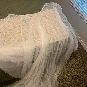Over skirt for wedding dress. I did not end up using for my wedding